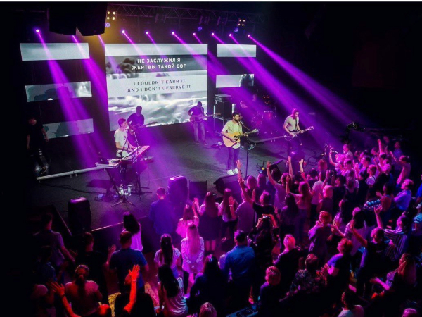 Church AV setup with LED screen and stage lighting for a Toronto congregation