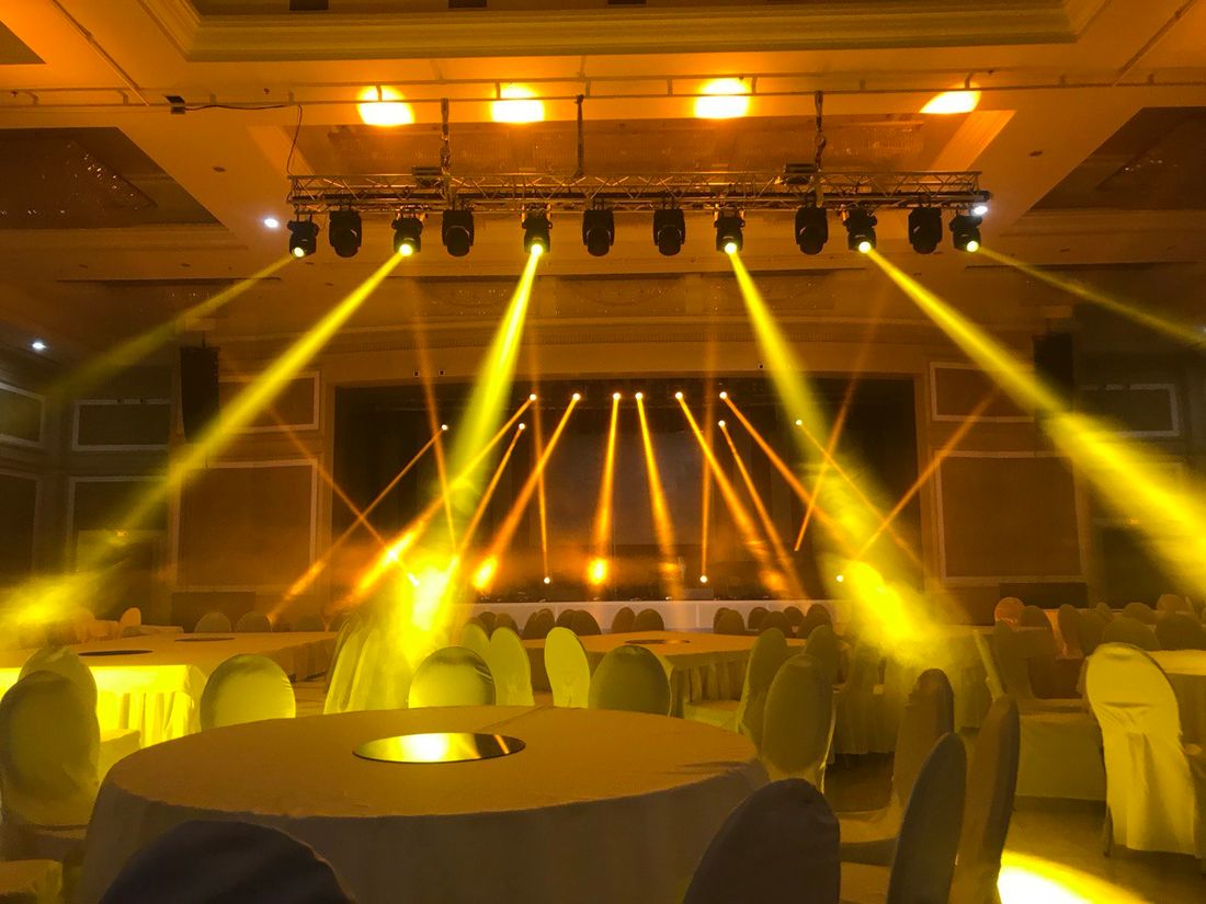 Moving heads at work during a Toronto concert Moving head beam lights creating aerial effects at concert stage in Toronto